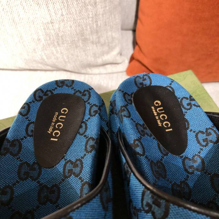 G*u*i slippers
