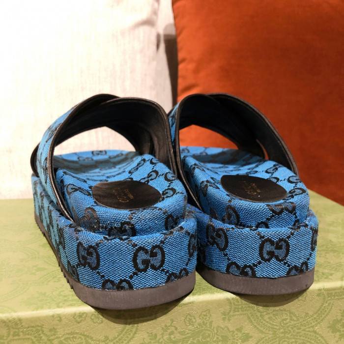 G*u*i slippers