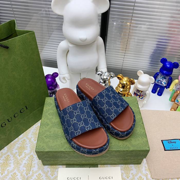 G*u*i slippers